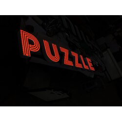 ป้ายตัวหนังสือไฟออกหน้า งานPUZZLE