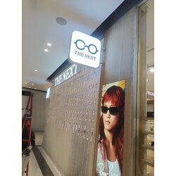 ป้ายกล่องไฟขายื่น งานป้ายร้านแว่นตาTHE NEXT