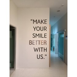 ป้ายติดกำแพง MAKE YOUR SMILE BETTER WITH US