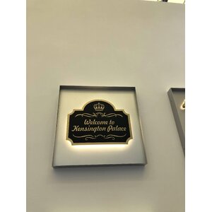 ป้ายไฟโลโก้โลหะ สแตนเลสกัดกรดไฟออกหลัง