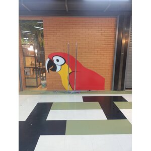 ป้ายปริ้นท์สติกเกอร์ติดลงบนกระจก รูปนกงานอเมซอน