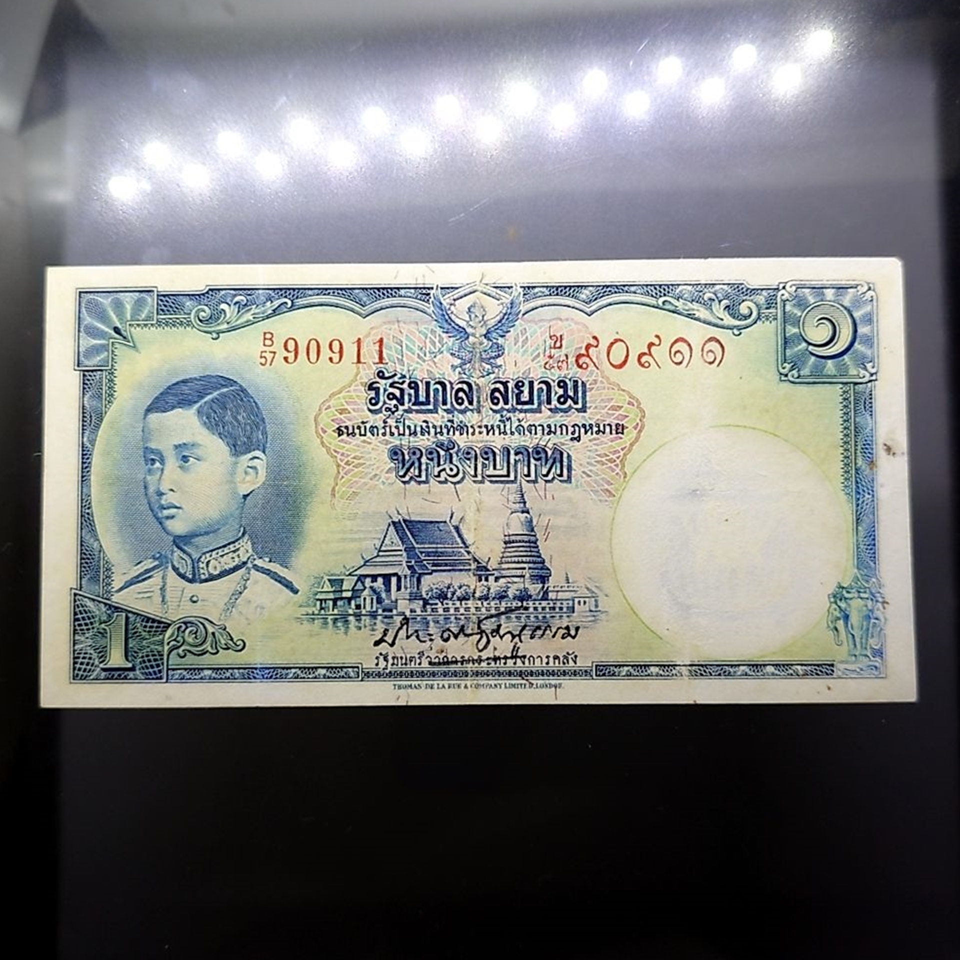 ธนบัตร 1 บาท แบบ 4 รุ่น 1 พิมพ์โทมัส เลขแดง ลายน้ำพาน สมัยรัชกาลที่8 ปี2481 ผ่านใช้