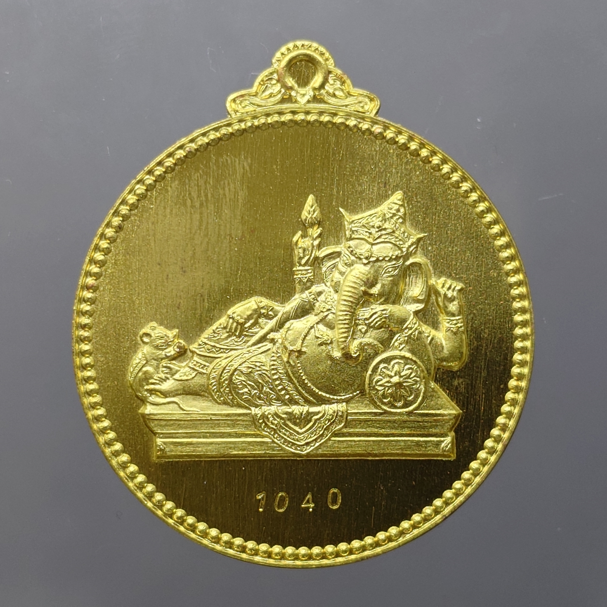 เหรียญพระพิฆเนศ "ไสยาสน์คเณศ" เนื้อสัตตะโลหะ รุ่น เสวยสุข วัดสมานรัตนาราม ปี2559 พร้อมตลับเดิม