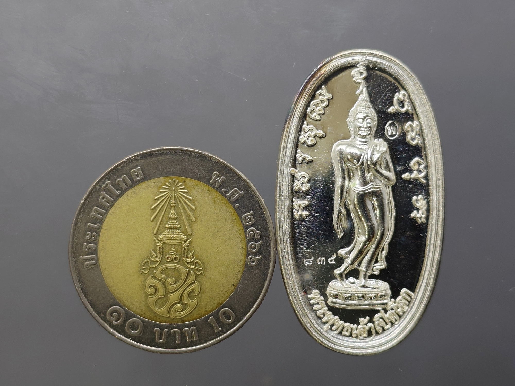 เหรียญเงินพระพุทธเจ้าเปิดโลก หลัง พระศิวะ เจ้าคุณธงชัยๆ วัดไตรมิตร พ.ศ.2559 พร้อมตลับเดิม