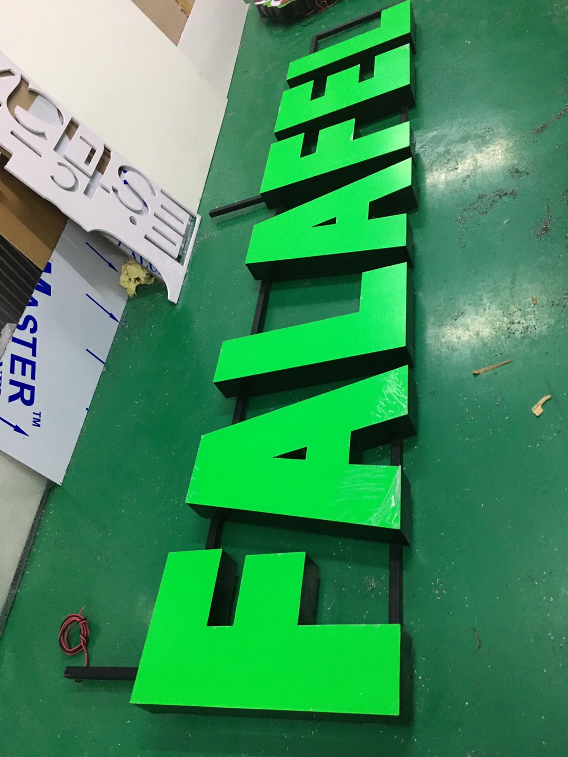 ป้ายไฟแอลอีดีไฟออกหน้าขอบอลูมิเนียม งานFALAFEL ASOK