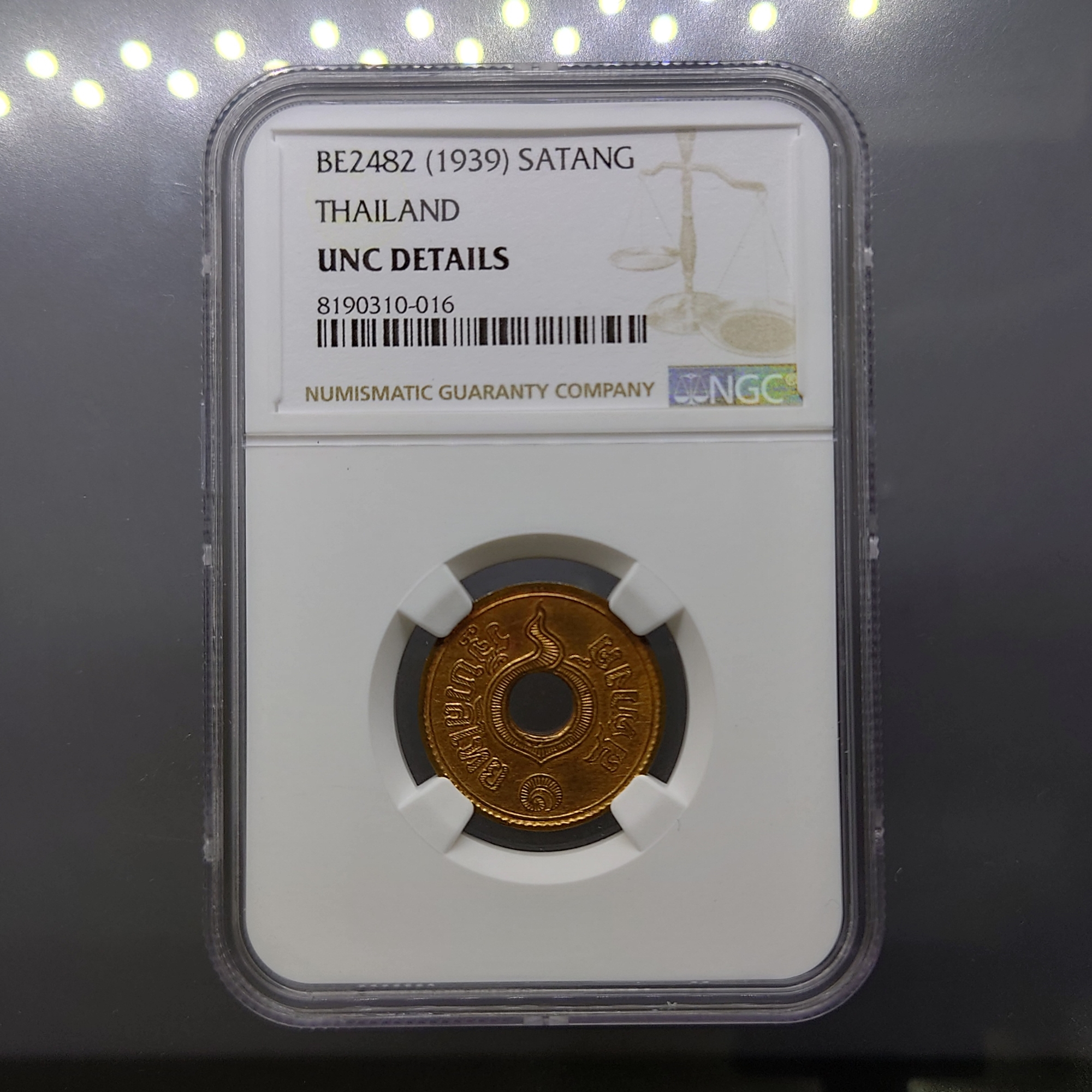 เหรียญเกรดดิ้ง เหรียญ 1 สตางค์ รู ทองแดง ปี 2482 UNC DETAIL NGC
