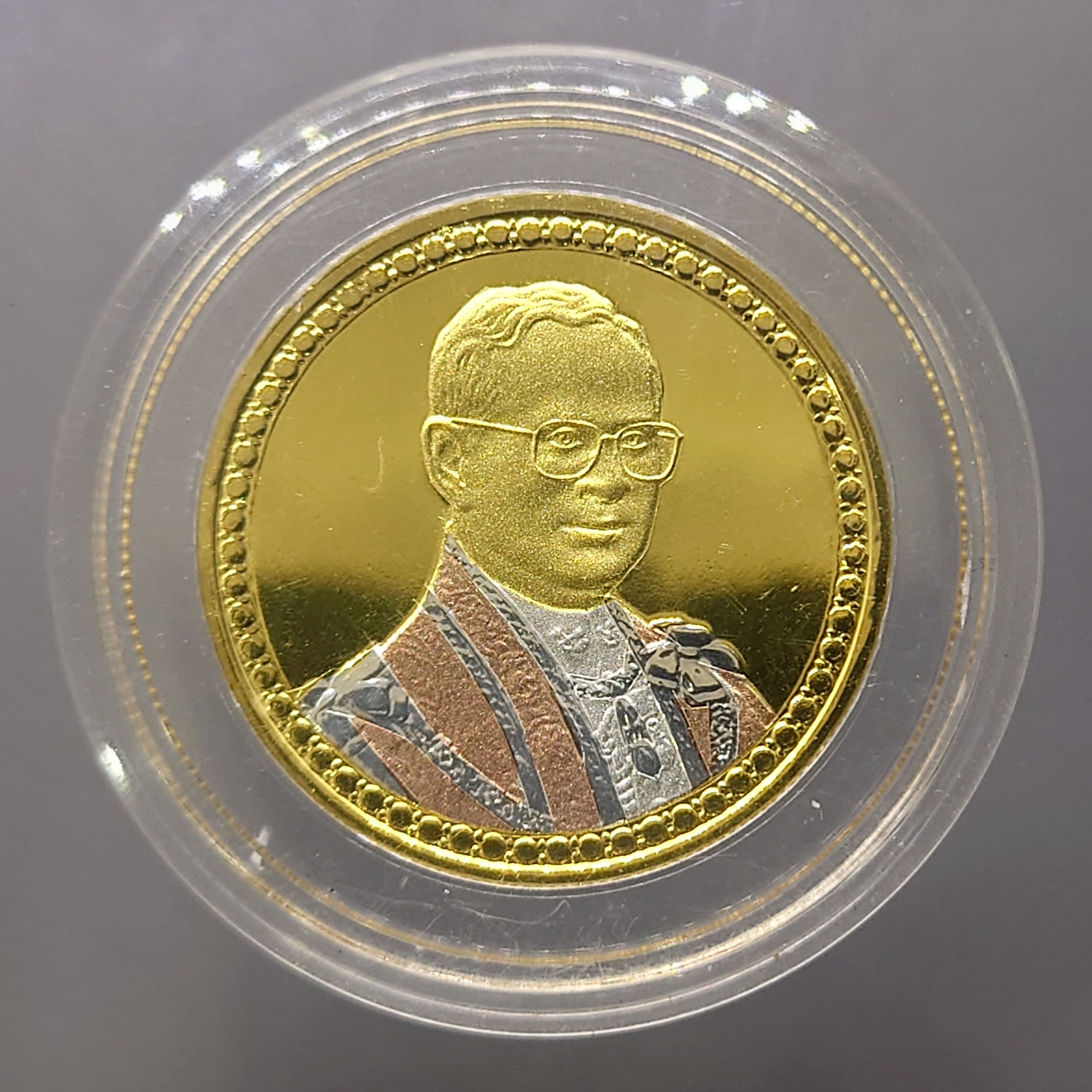 เเหรียญกษาปณ์ 20 บาท เนื้อนิเกิล ชุบสามกษัตริย์ ขัดเงาพ่นทราย ที่ระลึกพระราชพิธีครองราชครบ 60 ปี รัชกาลที่9 ขนาด 3.2 เซน ปี2549