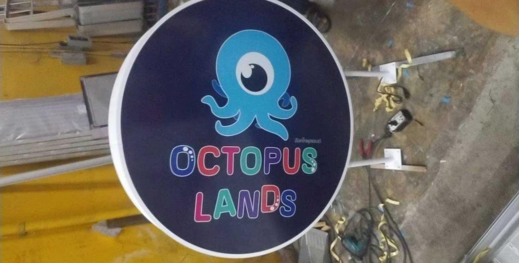 ป้ายตู้ไฟวงกลม ป้ายกล่องไฟวงกลม ป้ายหน้าร้าน "OCTOPUS LANDS"