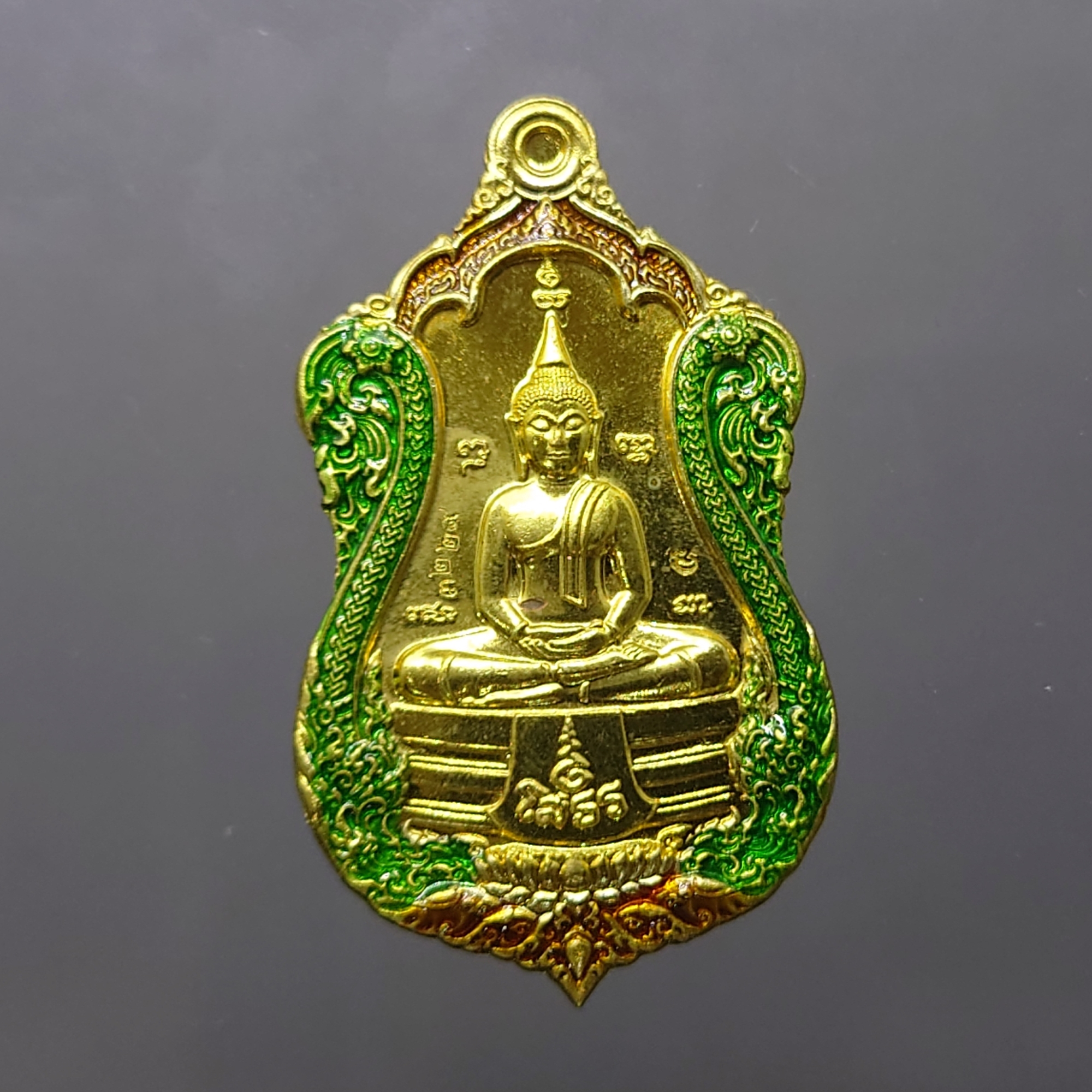 เหรียญหลวงพ่อโสธร หลังท้าวเวสสุวรรณ รุ่นประทารพร เนื้อทองทิพย์ ลงยาขอบ จัดสร้างโดย มูลนิธิมิราเคิล ออฟไลฟ์ พ.ศ.2563