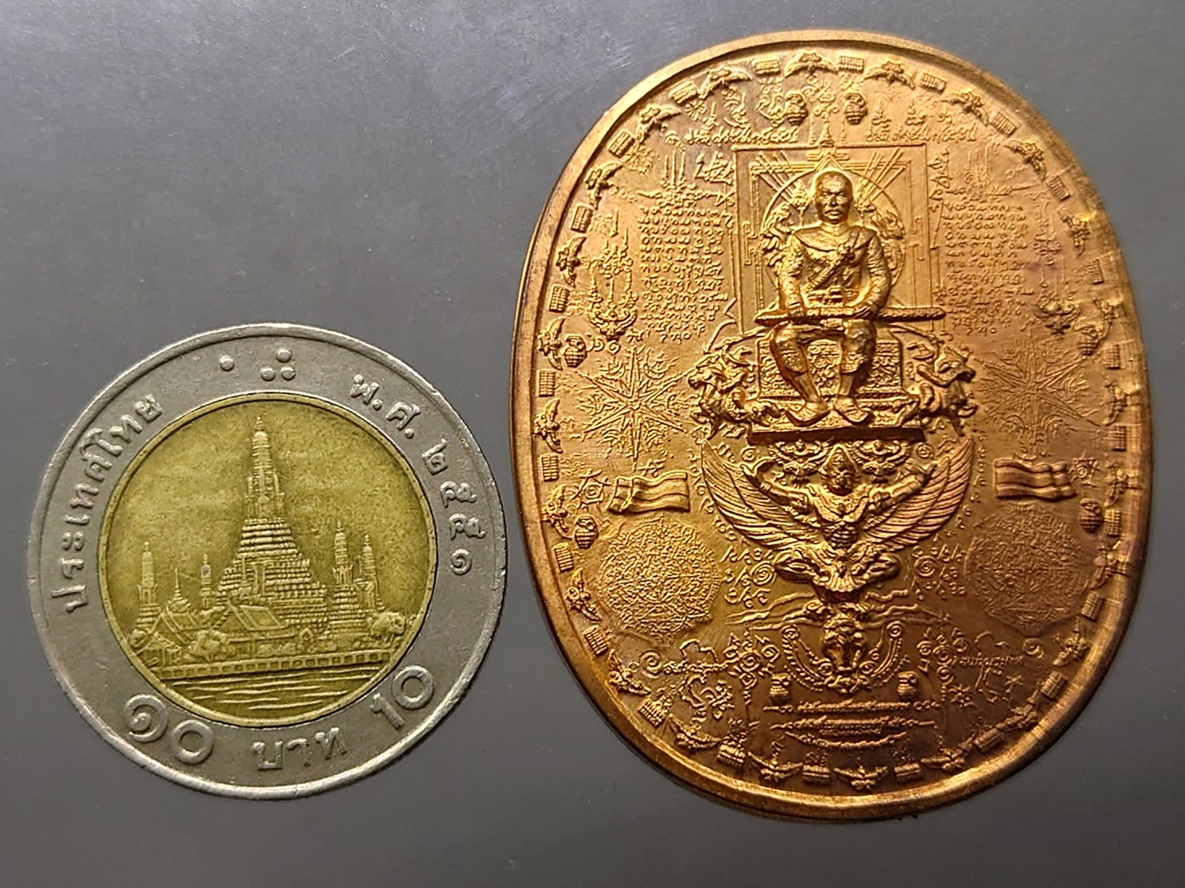 เหรียญมหายันต์ สมเด็จพระเจ้าตากสิน หม่อมน้อยสร้าง เนื้อชุบกะไหล่ทอง