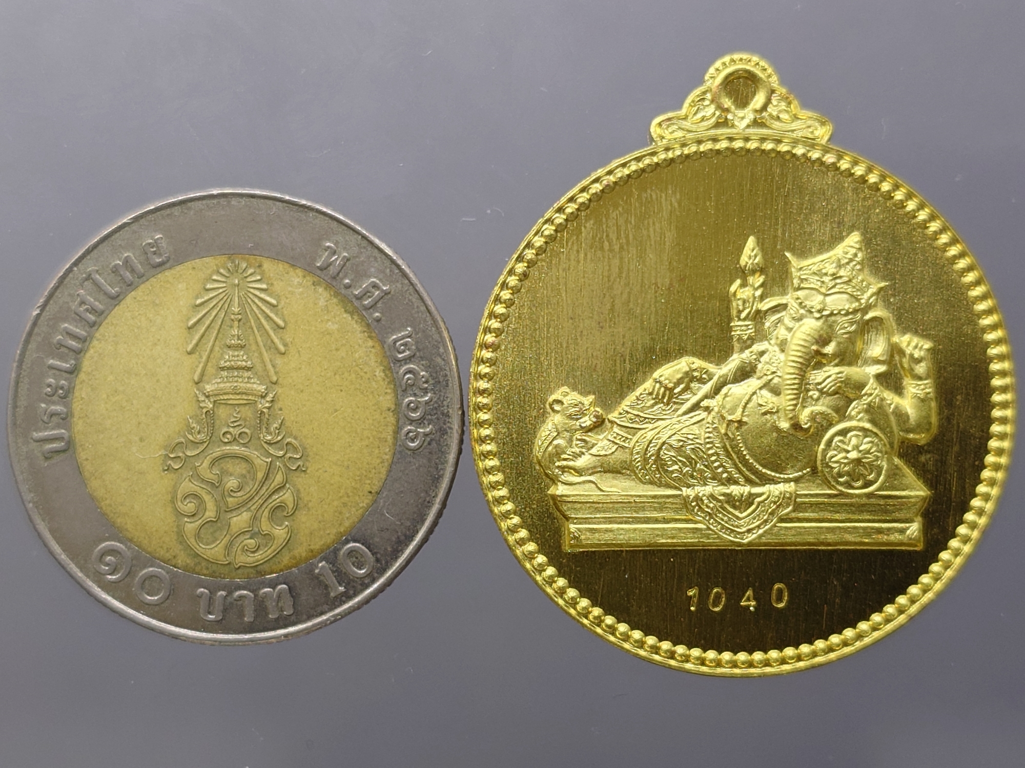 เหรียญพระพิฆเนศ "ไสยาสน์คเณศ" เนื้อสัตตะโลหะ รุ่น เสวยสุข วัดสมานรัตนาราม ปี2559 พร้อมตลับเดิม