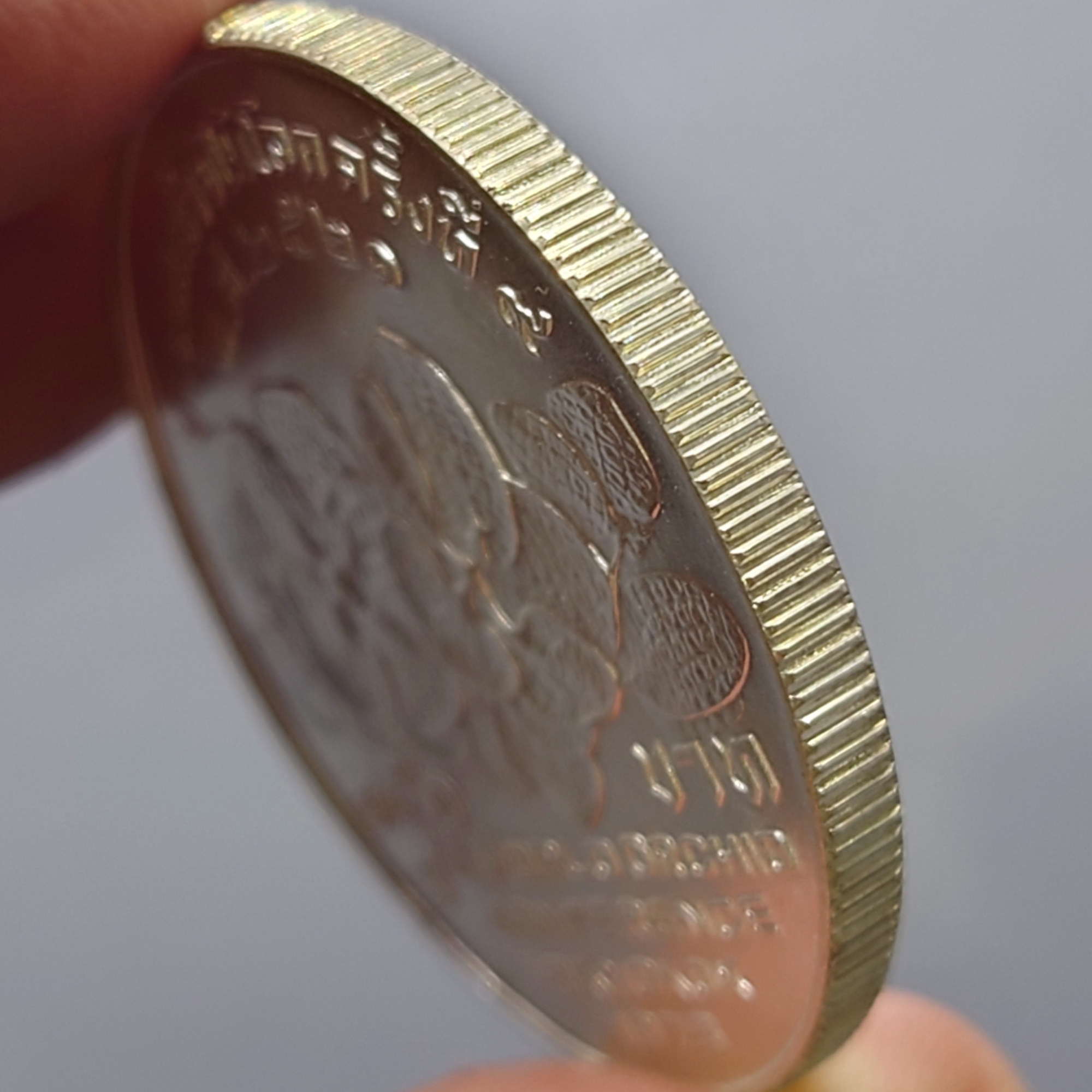 เหรียญเงิน 150 บาท ที่ระลึก งานชุมนุมกล้วยใม้โลก ครั้งที่ 9 พ.ศ.2521 ไม่ผ่านใช้