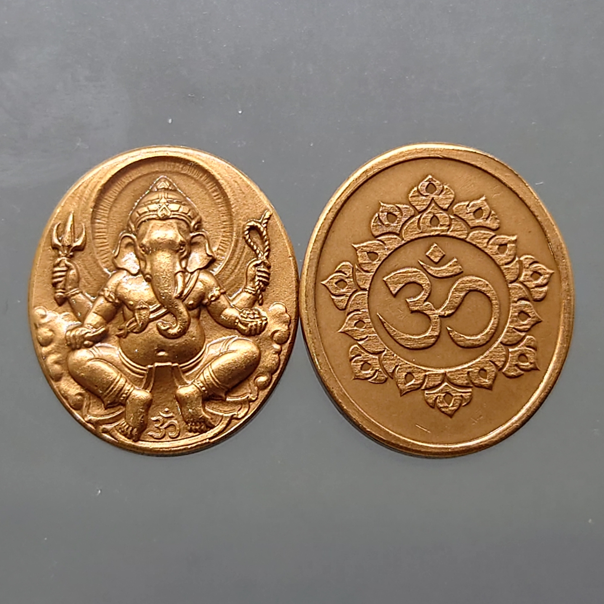 เหรียญพระพิฆเนศ หลังโอม พิมพ์เล็ก เนื้อทองแดงซาติน ที่ระลึก 108 ปี แห่งการสถาปนากรมศิลปากร 2562