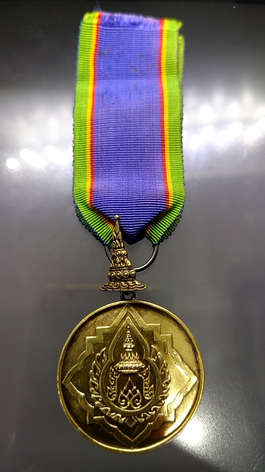 เหรียญเงินมงกุฎไทย (ร.ง.ม.) หลัง จปร ชั้นที่ ๗ พร้อมแพรแถบ แบบชาย