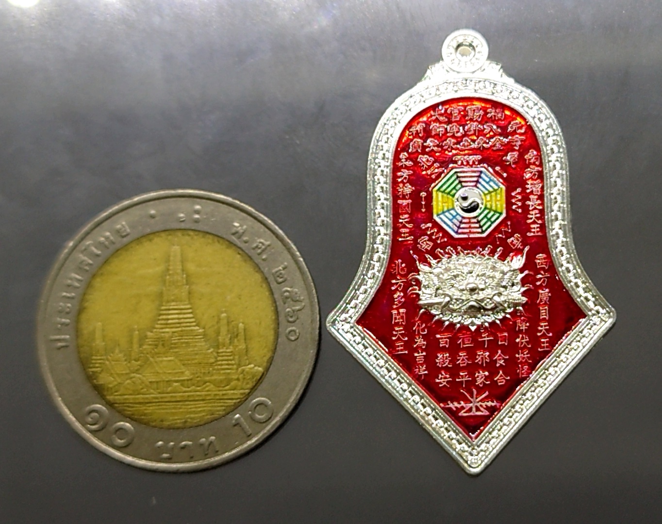 เหรียญกันชง เนื้อเงิน ลงยาแดง ทรงจำปี พิมพ์ใหญ่ รุ่น5 หลวงพ่ออิฎฐ์ วัดจุฬามณี 2565