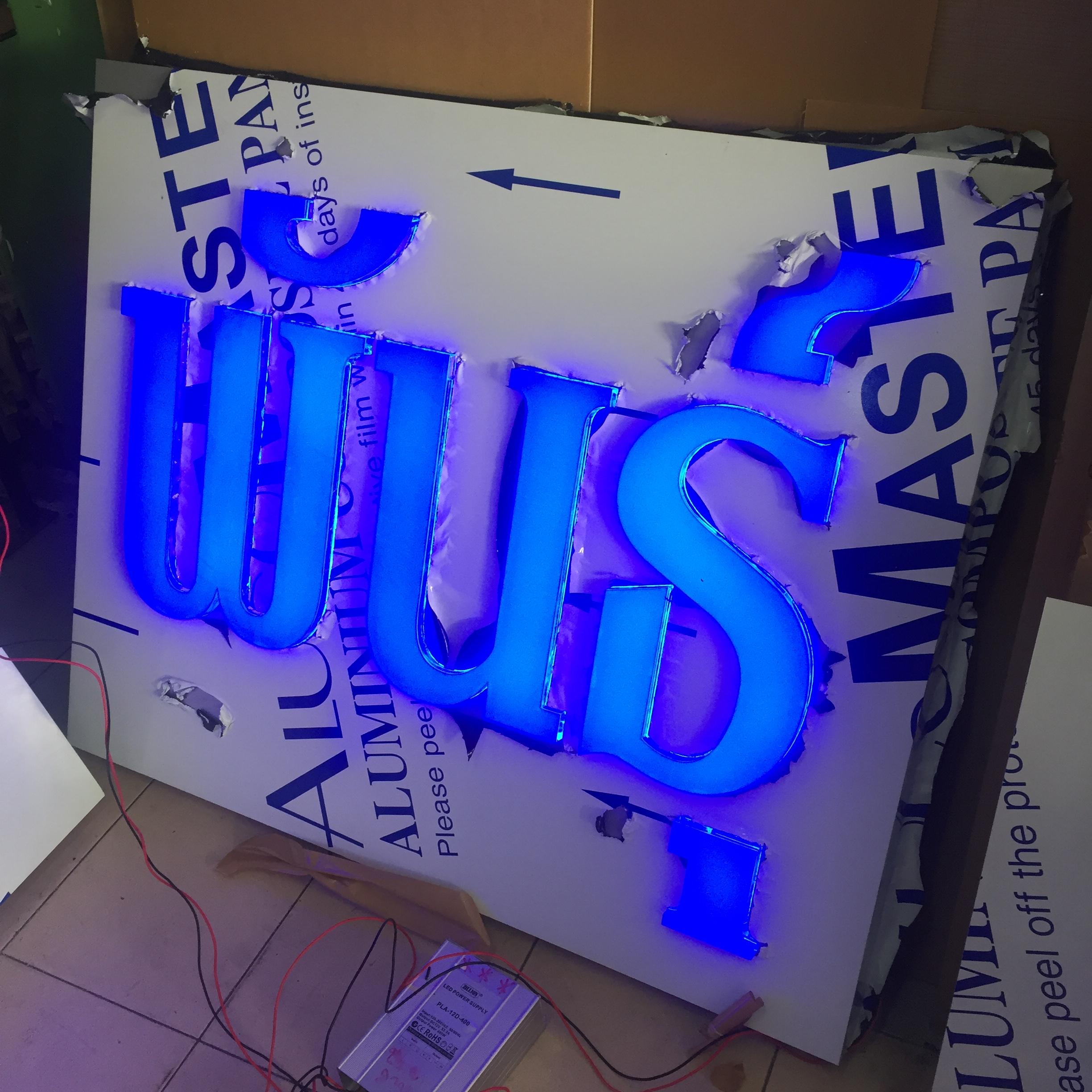 ป้ายตัวอักษรไฟออกหน้าพื้นคอมโพสิต งานปลูกพันธุ์ข้าว