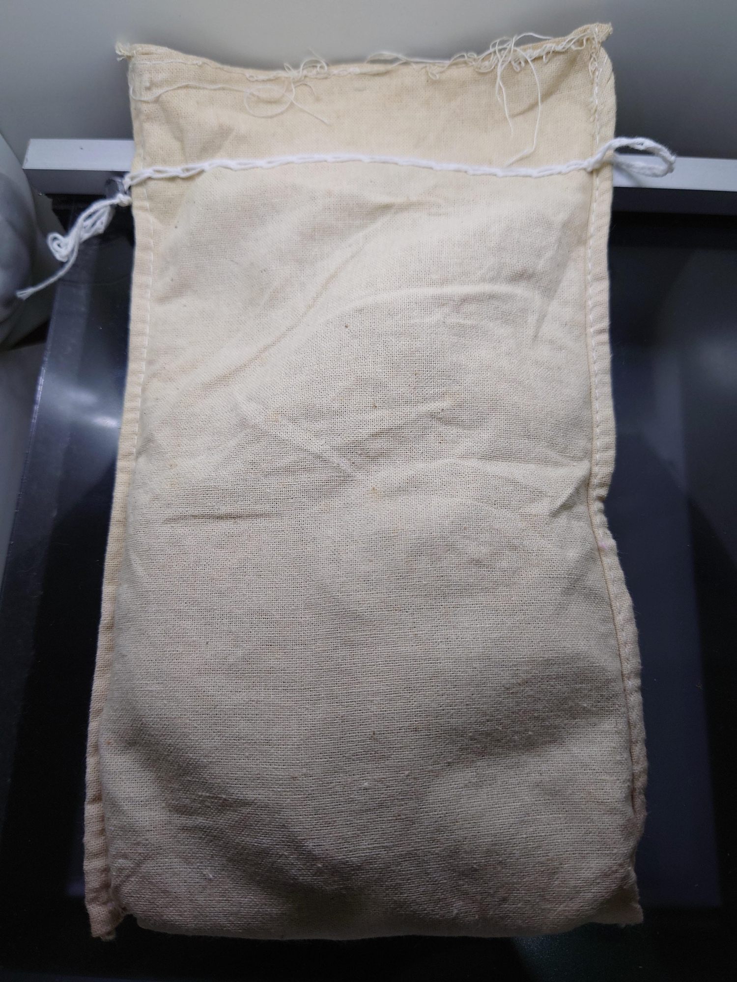 เหรียญยกถุง (100 เหรียญ) เหรียญ 10 บาท สองสี ที่ระลึกครบ 60 ปี กรมการค้าภายใน พ.ศ.2545 ไม่ผ่านใช้