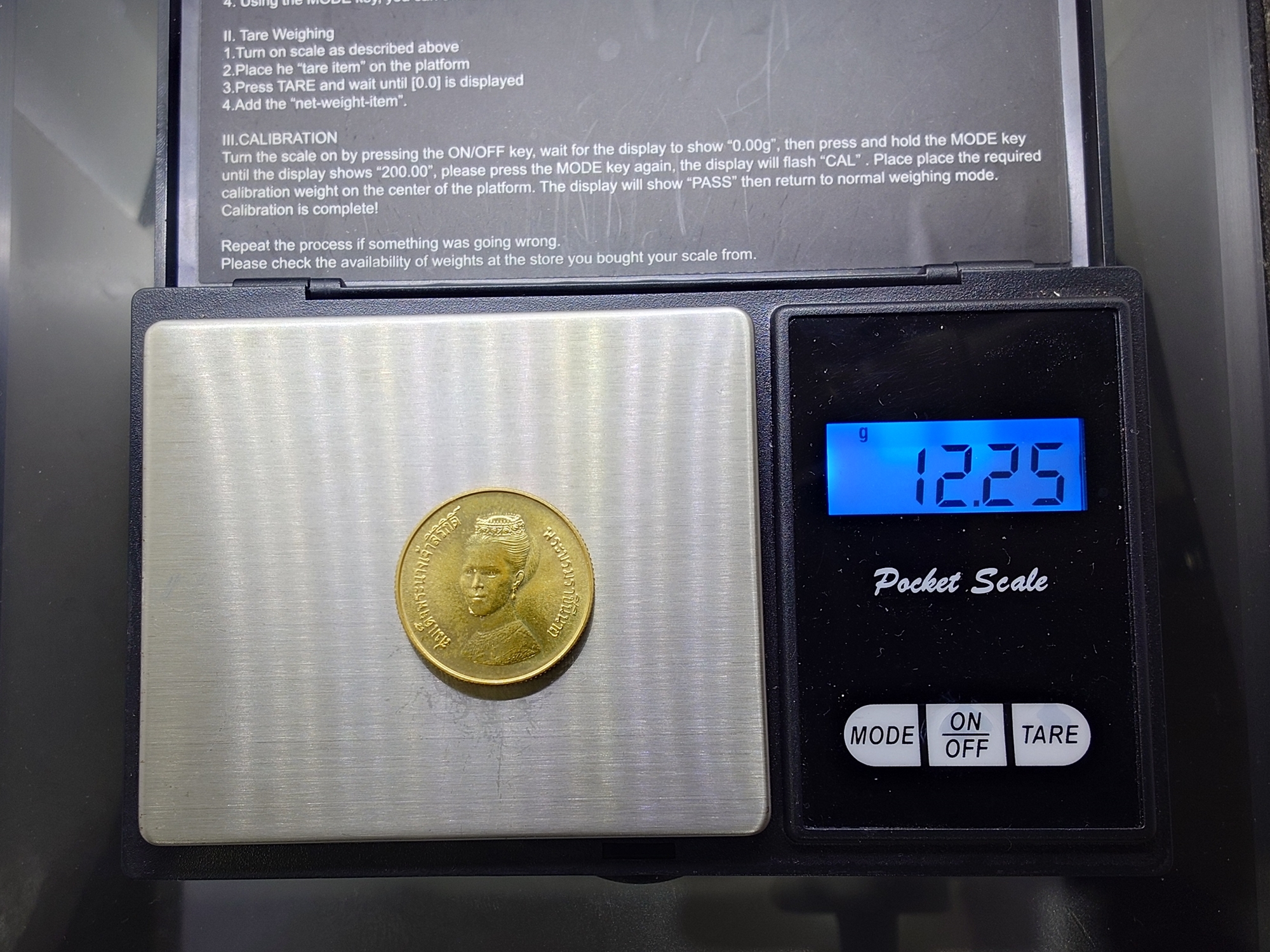 เหรียญทองคำ 9000 บาท (หนัก 12 กรัม) ที่ระลึกอัญเชิญพระฉายาสาทิสลักษณ์ ราชินี ลงบนเหรียญ CERES พ.ศ.2523 วาระนิยม