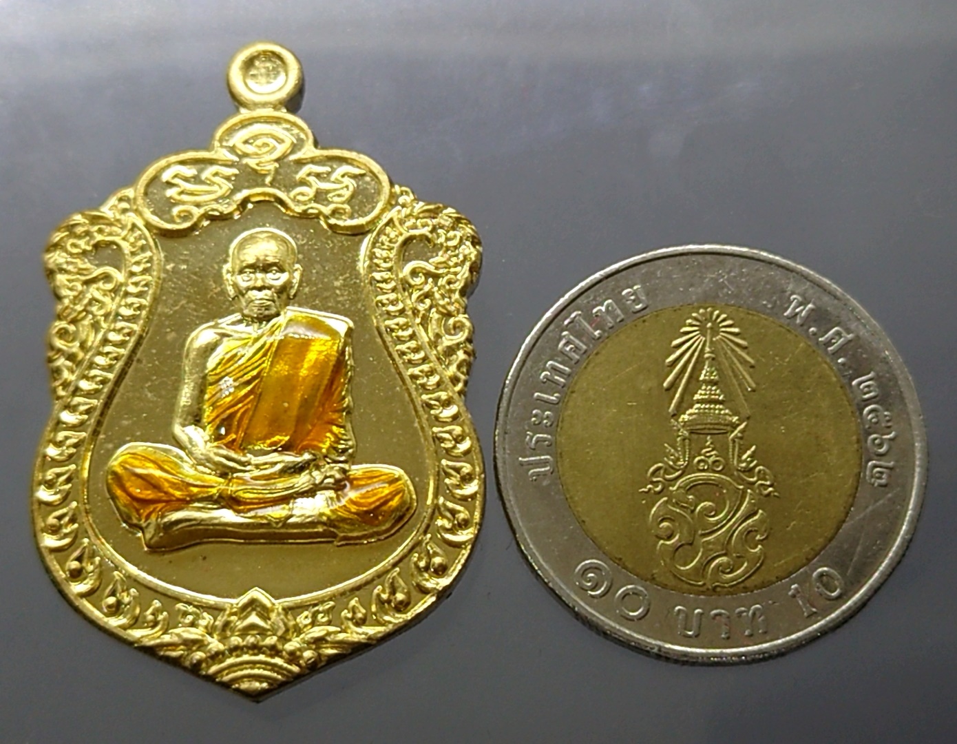 เหรียญมหาเศรษฐี 99 เนื้อทองทิพย์ ลงยาจีวร (ป๋อง สุพรรณ) หลวงพ่อพัฒน์ วัดห้วยด้วน