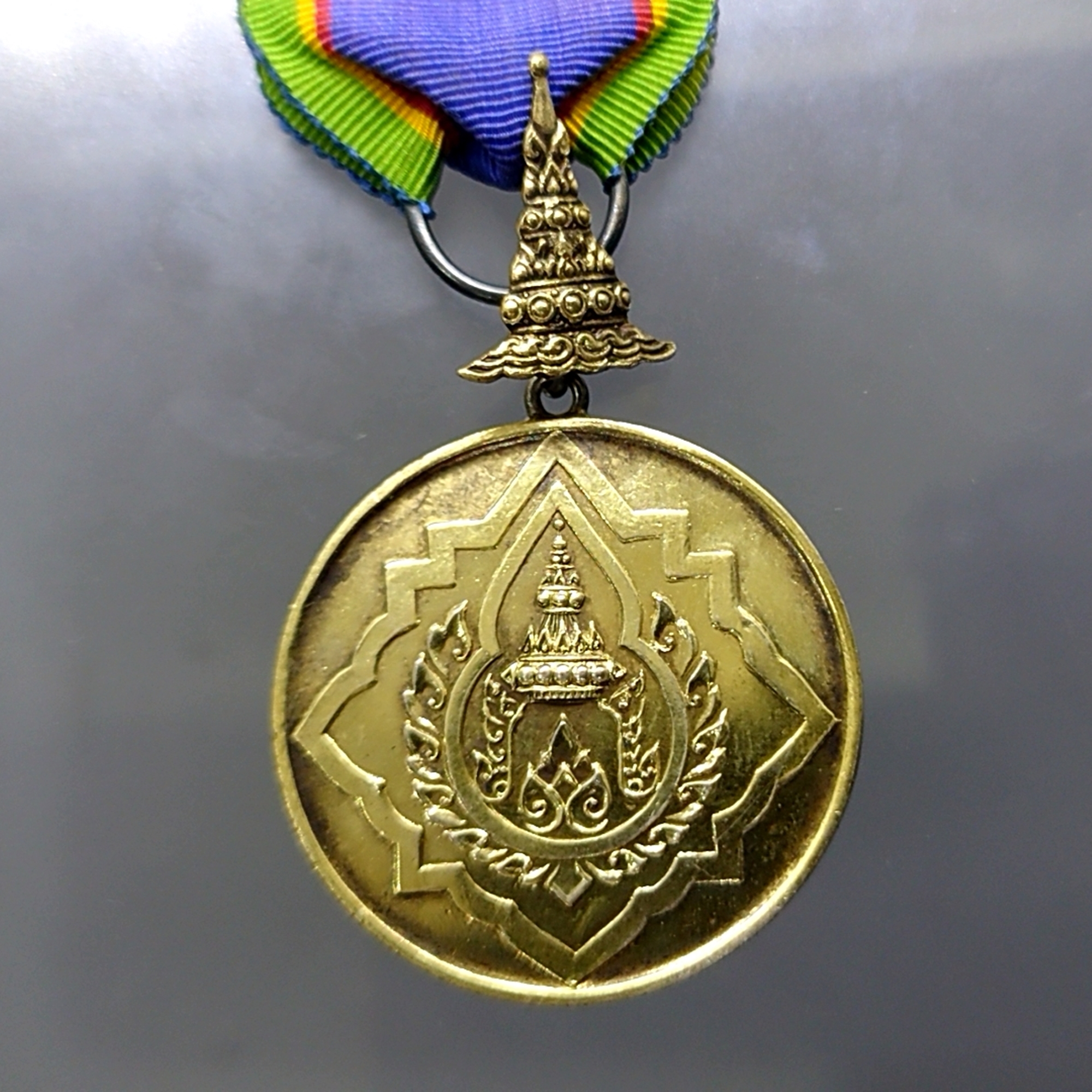เหรียญเงินมงกุฎไทย (ร.ง.ม.) หลัง จปร ชั้นที่ ๗ พร้อมแพรแถบ แบบชาย