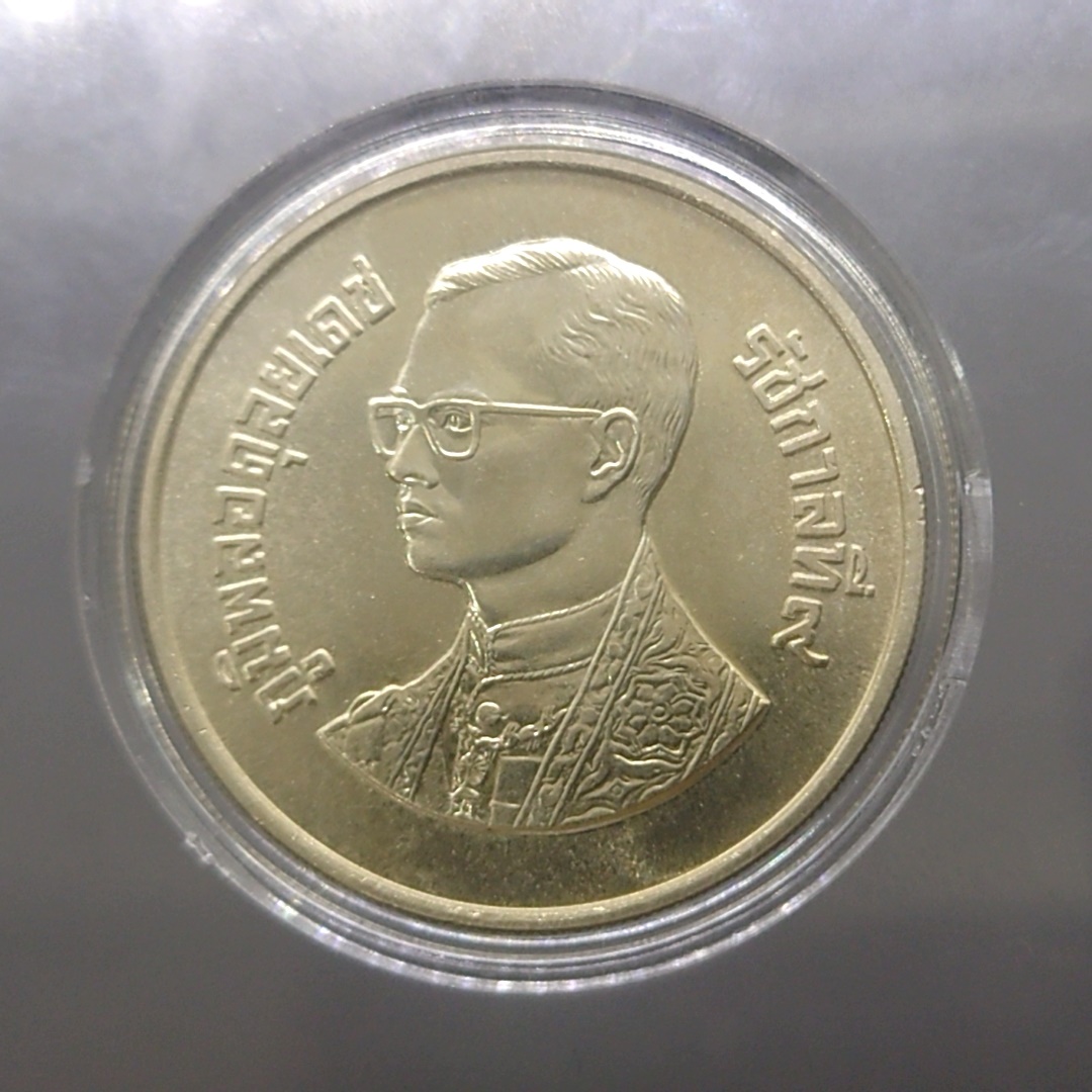 เหรียญ 600 บาท เนื้อเงิน ที่ระลึกงานกล้วยไม้อาเซียน ครั้งที่ 6 พ.ศ.2529