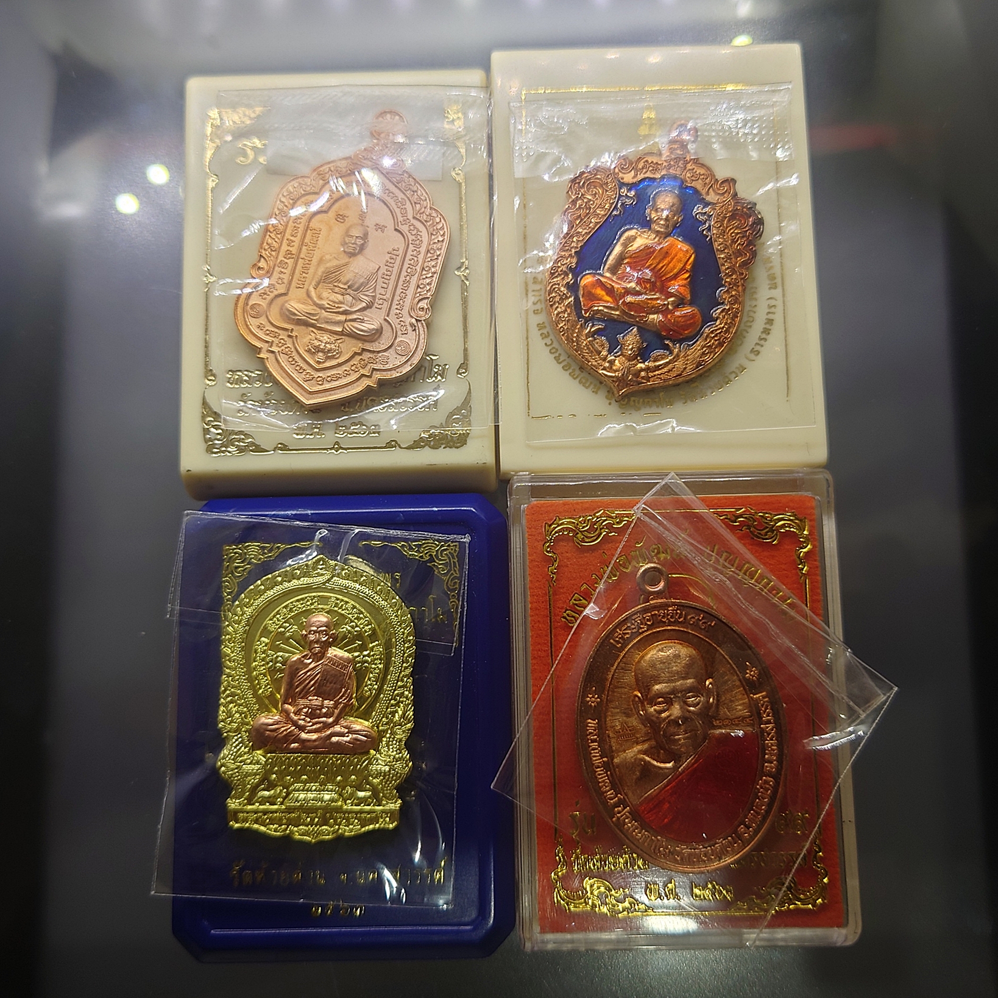 ชุด 4 เหรียญ 4 รุ่น เหรียญหลวงพ่อพัฒน์ วัดห้วยด้วน พร้อมตลับเดิม (S1)