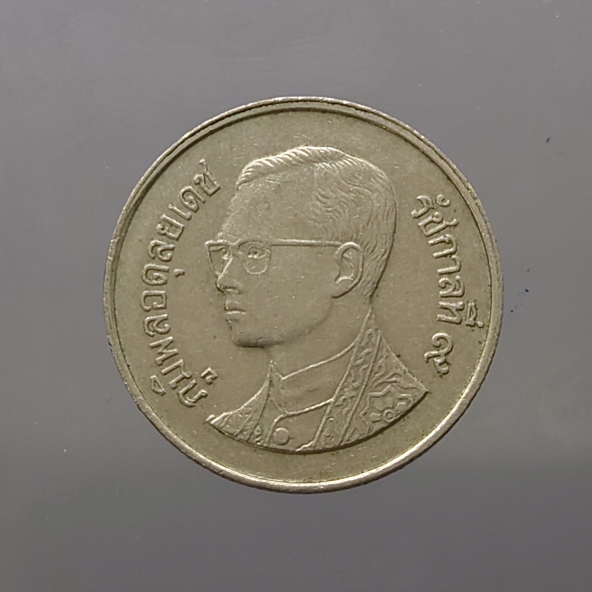 เหรียญ 1 บาท หมุนเวียน ปี พ.ศ.2529 ผ่านใช้งานน้อย "ช่อฟ้าสั้น" (ตัวติดลำดับ1)