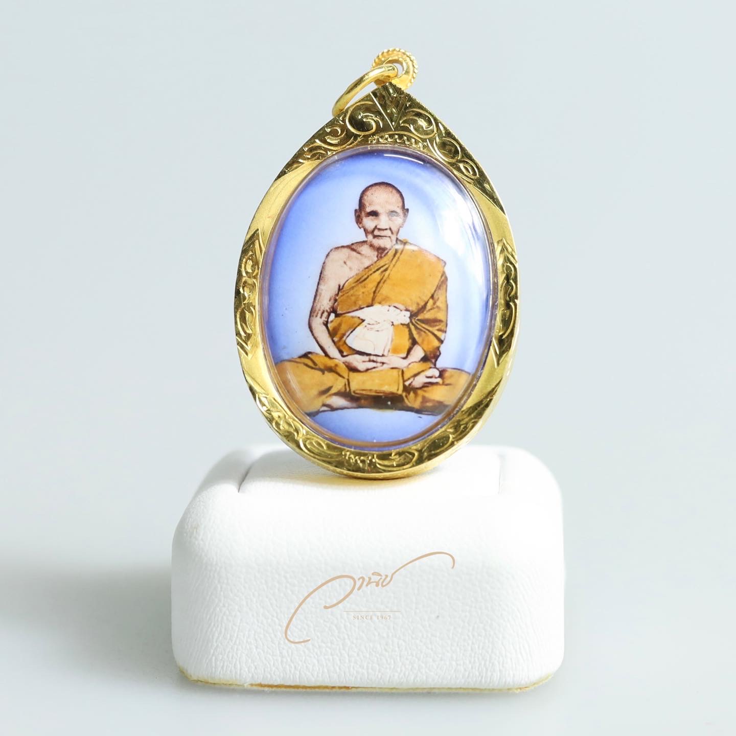ล็อกเก็ตรุ่นบรรจุอัฐิและอังคารธาตุ หลวงปู่ดู่ พ.ศ.๒๕๖๒ เลี่ยมกรอบทองคำ