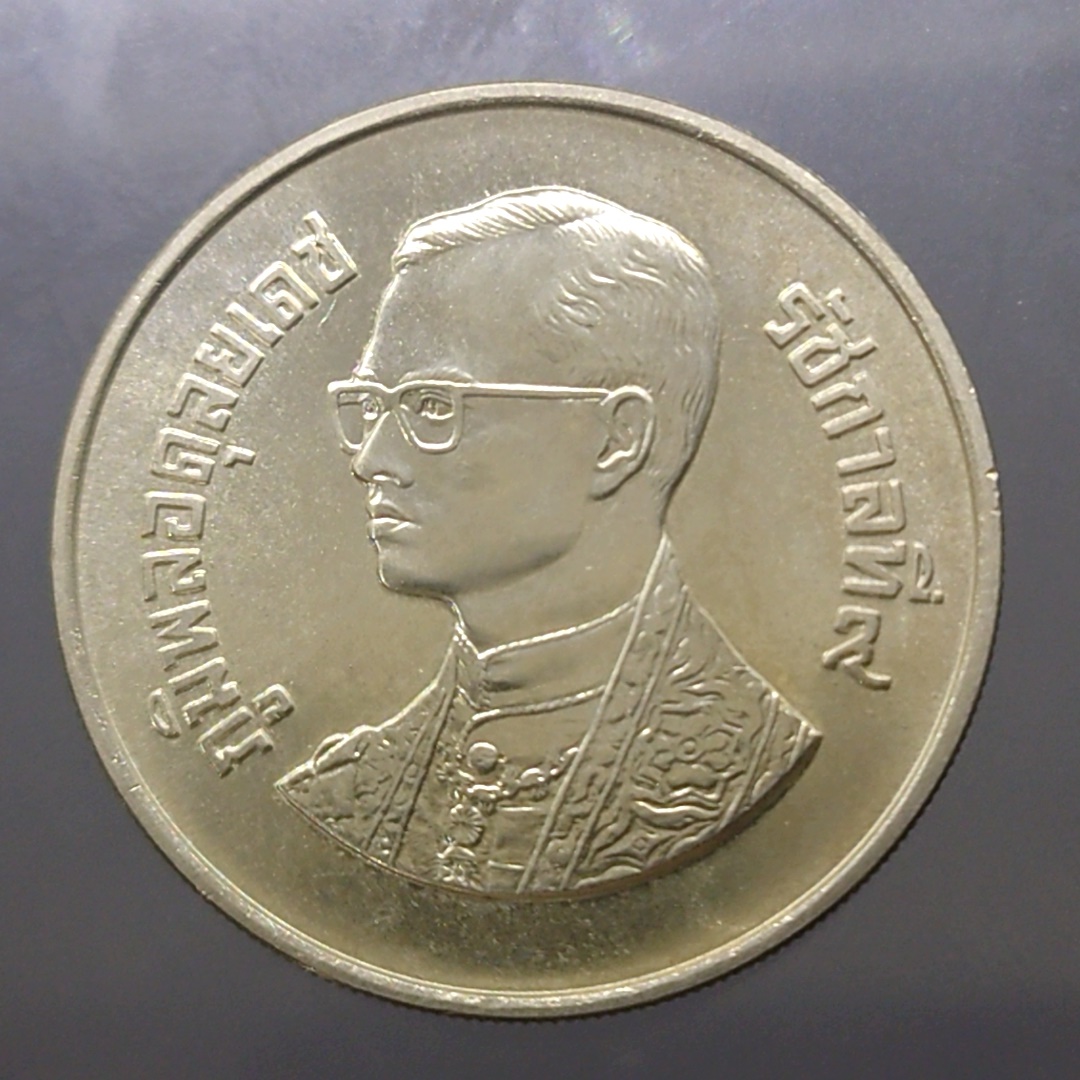 เหรียญ 600 บาท เนื้อเงิน ที่ระลึกงานกล้วยไม้อาเซียน ครั้งที่ 6 พ.ศ.2529