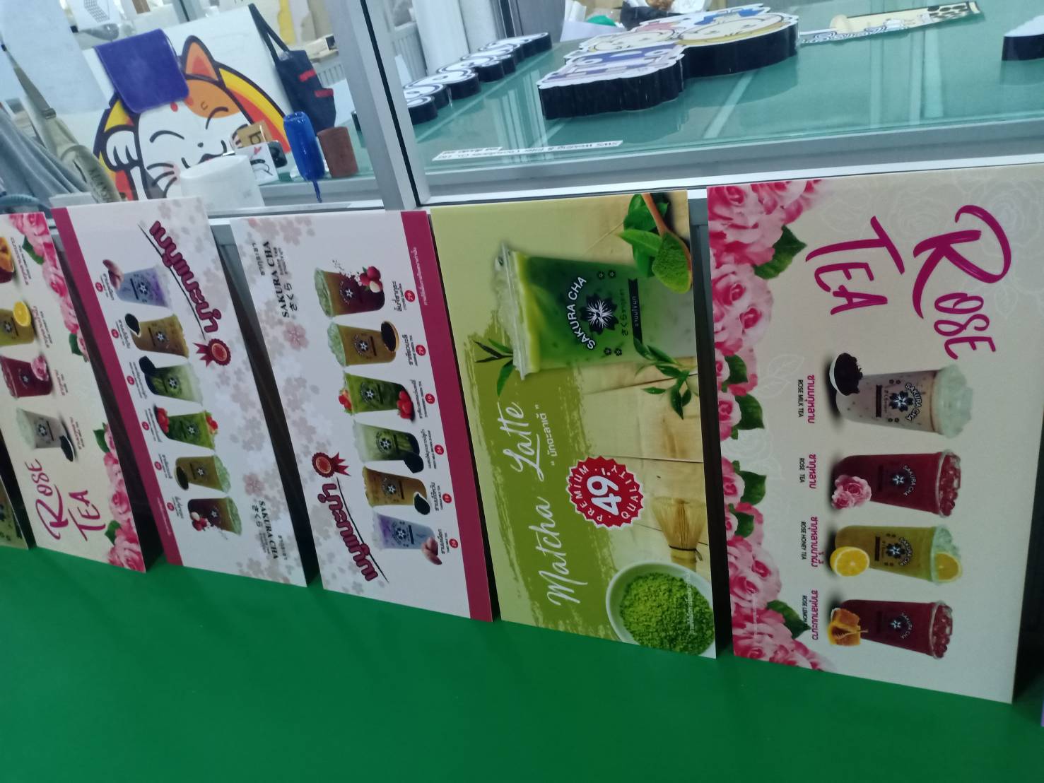ป้ายพิมพ์ลงแผ่นคอมโพสิต งานตรีมิตรและROSE TEA