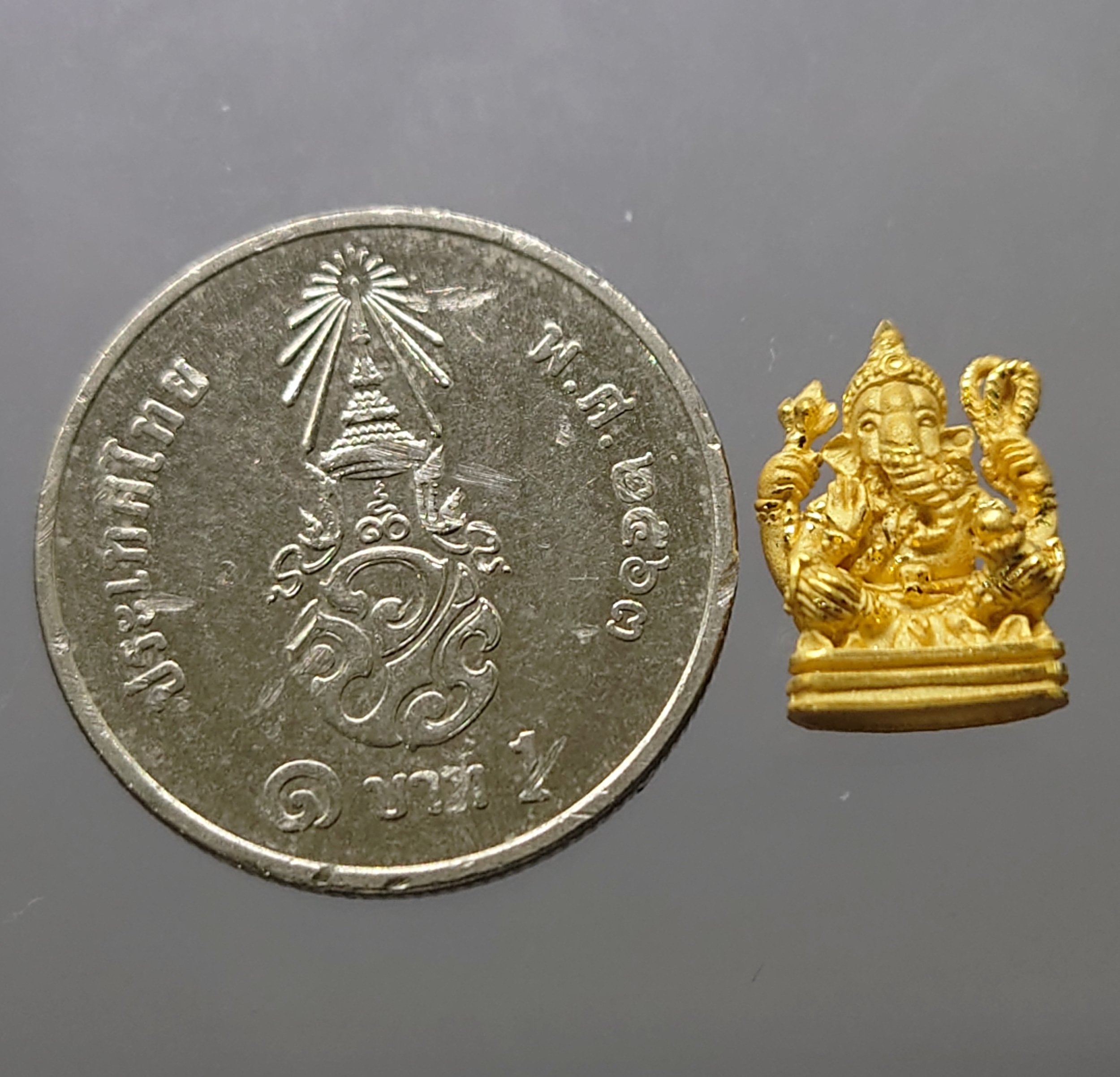 พระพิฆเนศ เนื้อทองคำแท้ รุ่นอุดมโชคโภคทรัพย์ วัดโสธรวราราม พ.ศ.2550 พร้อมกล่องเดิม