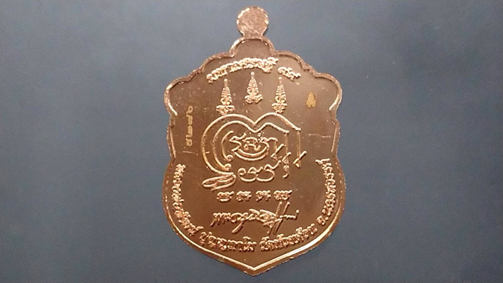 เหรียญมหาเศรษฐี 99 ทองเแดงลงยาธงชาติ ลงยาจีวร (ป๋อง สุพรรณ) หลวงพ่อพัฒน์ วัดห้วยด้วน