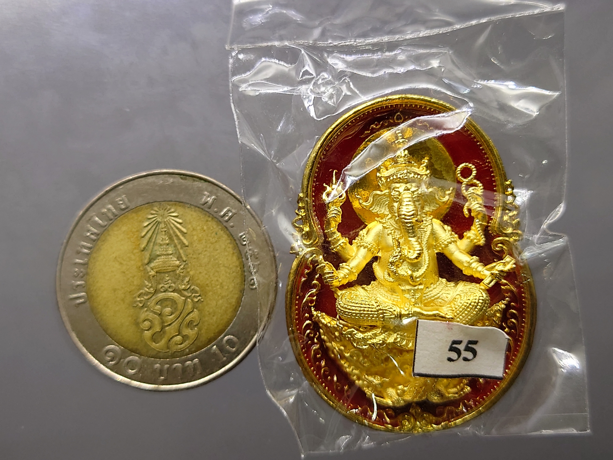 พระพิฆเนศ สุข สำเร็จ รวย เนื้อทองระฆัง องค์ชุบทอง พ่นทราย ลงยาแดง โคท 55 หลวงพ่อพระมหาสุรศักดิ์ วัดประดู่ จ.สมุทรสงคราม อธิษฐานจิตปลุกเสก ปี2563 พร้อมกล่องเดิม