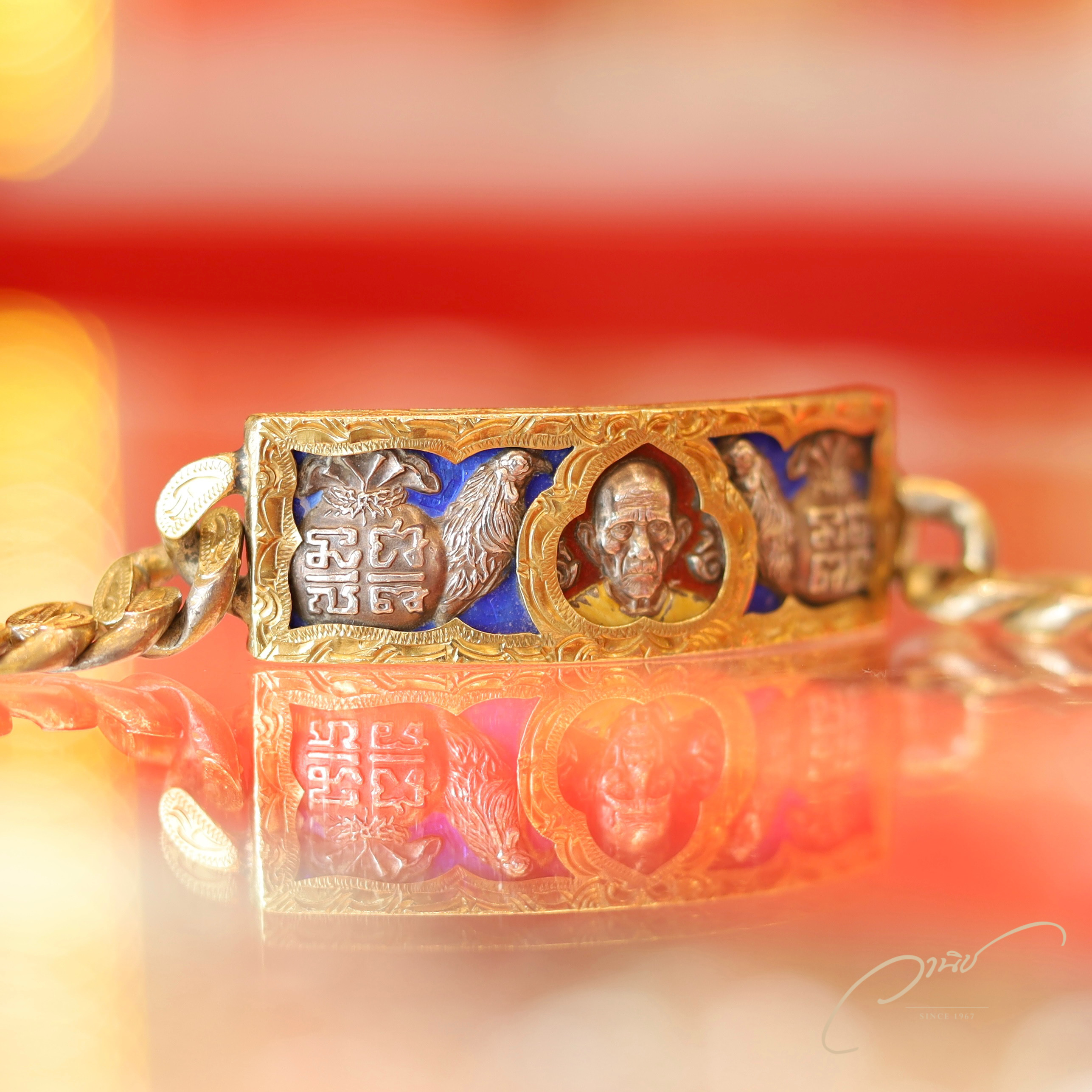 เลสหลวงพ่อรวย รุ่นไตรมาส 93 ปี 2557 น้ำหนัก 4 บาท เลี่ยมขอบทองแท้ แปะทองแท้ที่สายเลส