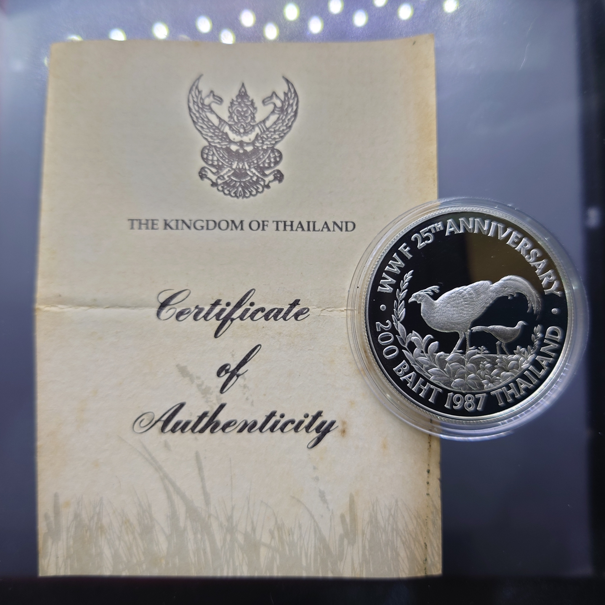 เหรียญเงินขัดเงา 200 บาท ที่ระลึกครบรอบ 25 ปี กองทุนคุ้มครองสัตว์ป่าโลก ไก่ฟ้า ปี 2530 พร้อมใบเซอร์ สภาพสวย