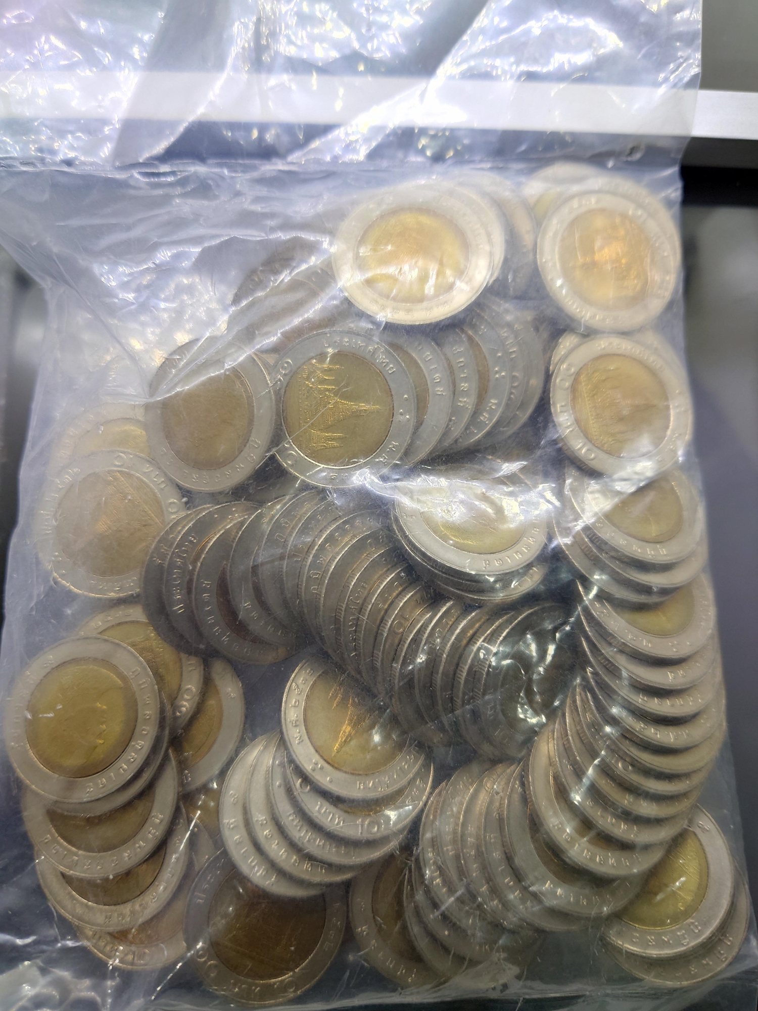 เหรียญยกถุง (100 เหรียญ) เหรียญ 10 บาท หมุนเวียน ปี พ.ศ.2532 ไม่ผ่านใช้ เหรียญแกะหลอด หลอดแตก