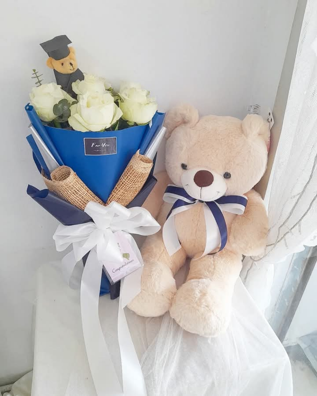 ตุ๊กตาหมี 60 cm.พร้อมช่อดอกกุหลาบ 7 ดอก