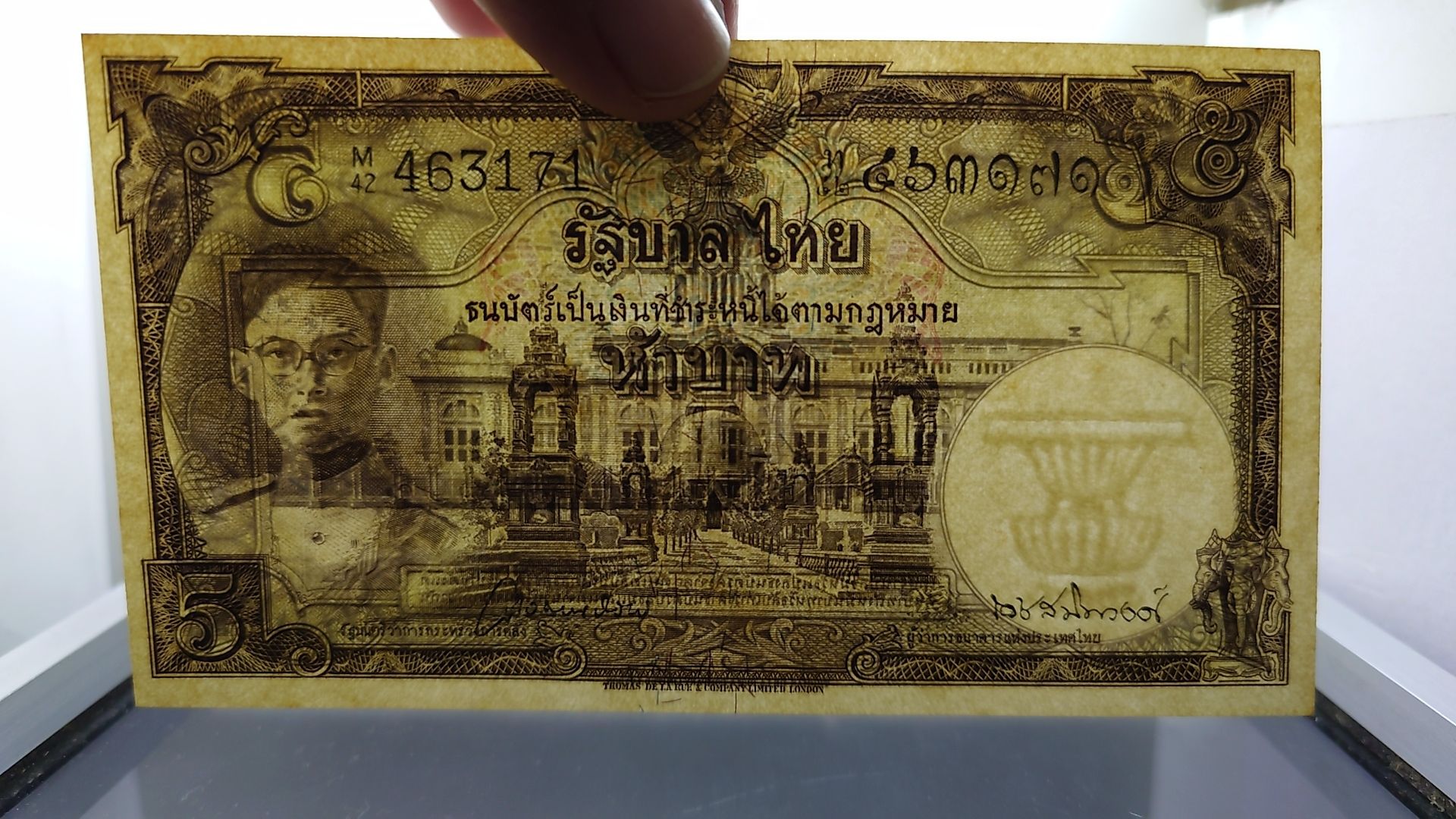 ธนบัตร 5 บาท แบบ 9 รุ่น 2 หน้าหนุ่ม เลขดำ ลายน้ำพาน (โทมัส) ไม่ผ่านใช้ เดิมๆ