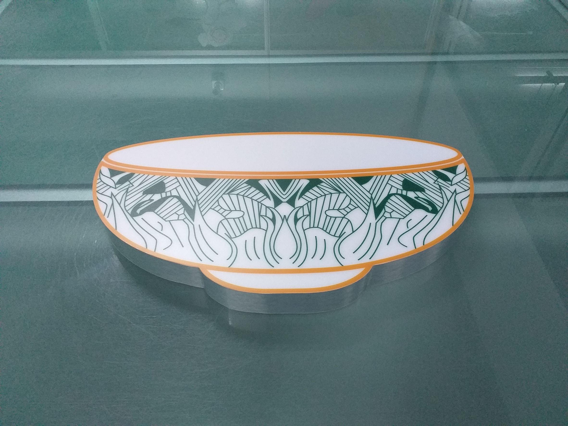 งานปริ้นท์สติกเกอร์โปร่งแสงลงบน โลโก้ถ้วยเบญจรงค์ เตรียมผลิต