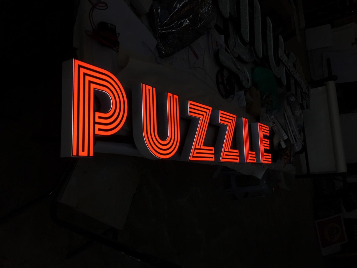 ป้ายตัวหนังสือไฟออกหน้า งานPUZZLE