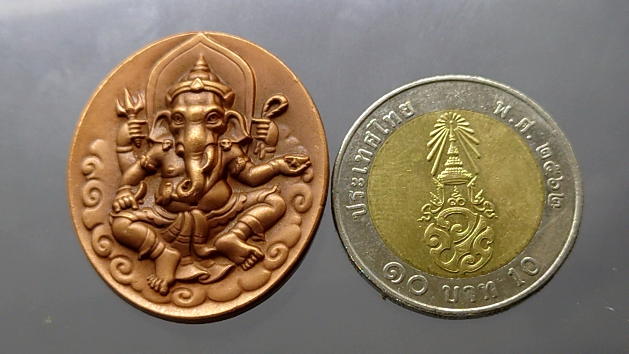 เหรียญพระพิฆเนศ หลังสัญลักษณ์โอม พิมพ์ใหญ่ กรมศิลปากร สำนักช่างสิบหมู่ ปี 2539