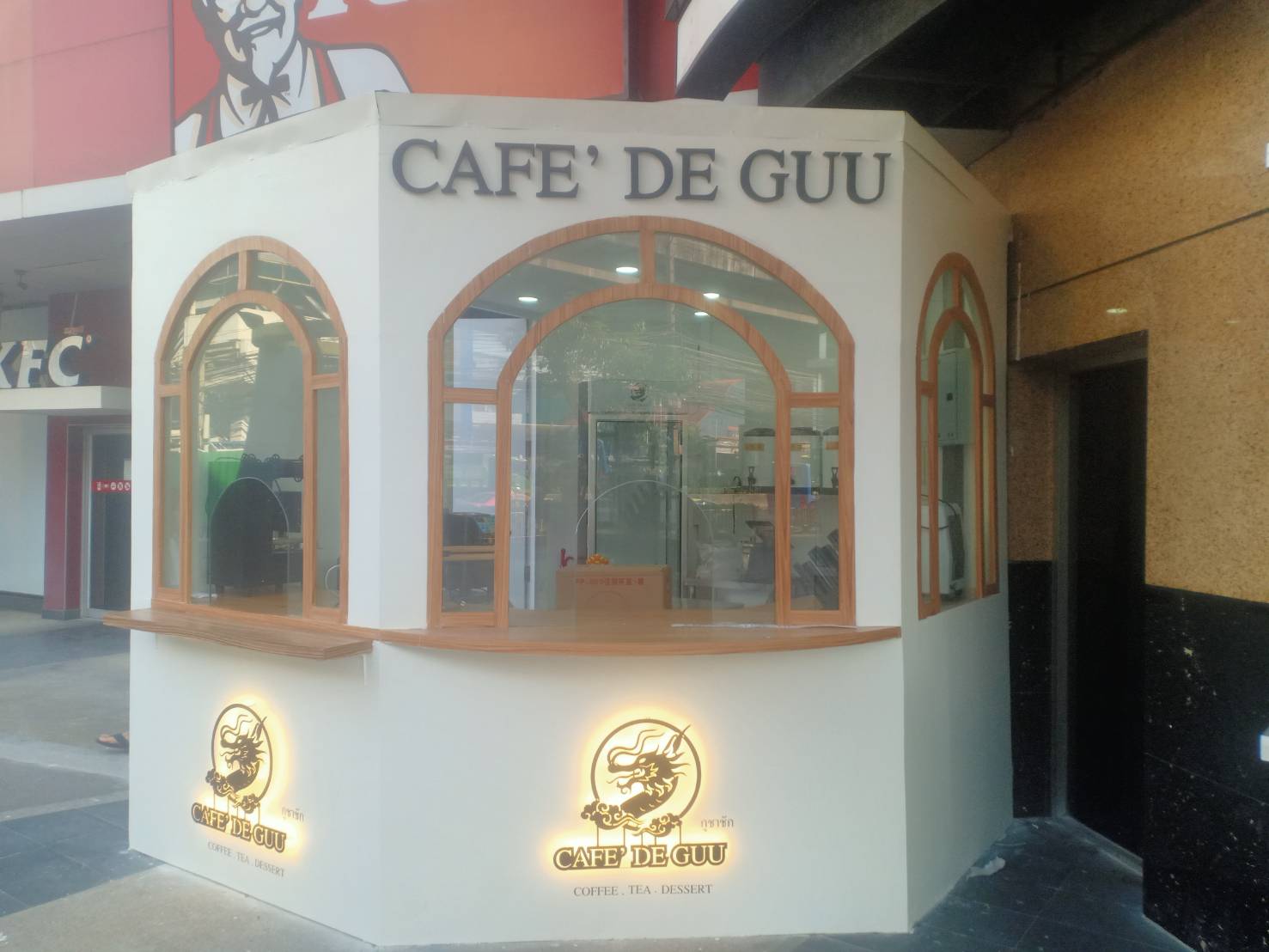 ป้ายไฟออกหลัง เลเซอร์เหล็กเป็นลายมังกร งาน CAFE DE GUU กูชาชัก