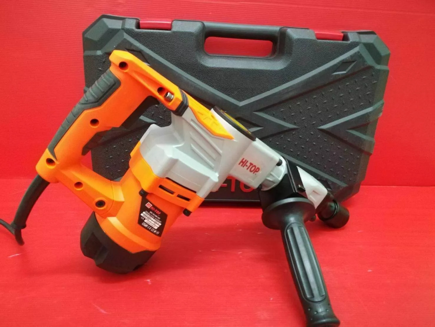 รหัสสินค้า 004 เครื่องสกัดปูนไฟฟ้า ขนาด 5กิโล แรงกระแทก 15J กำลัง 1200วัตต์ หัวดอก 17mm HI-TOP รุ่น DH-1010W(V2) (รับประกัน 6เดือน)