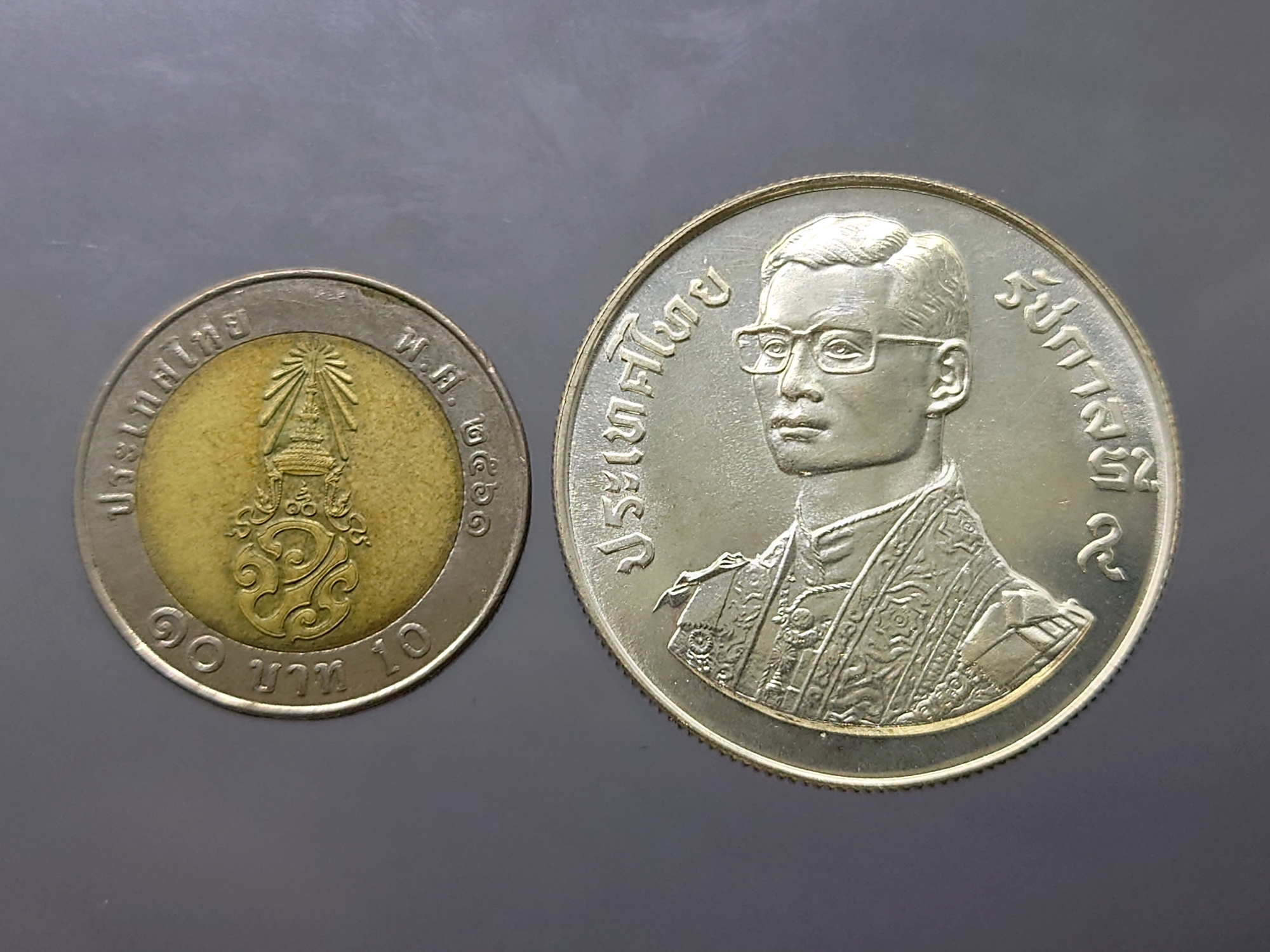 เหรียญเงิน 150 บาท ที่ระลึก งานชุมนุมกล้วยใม้โลก ครั้งที่ 9 พ.ศ.2521 ไม่ผ่านใช้