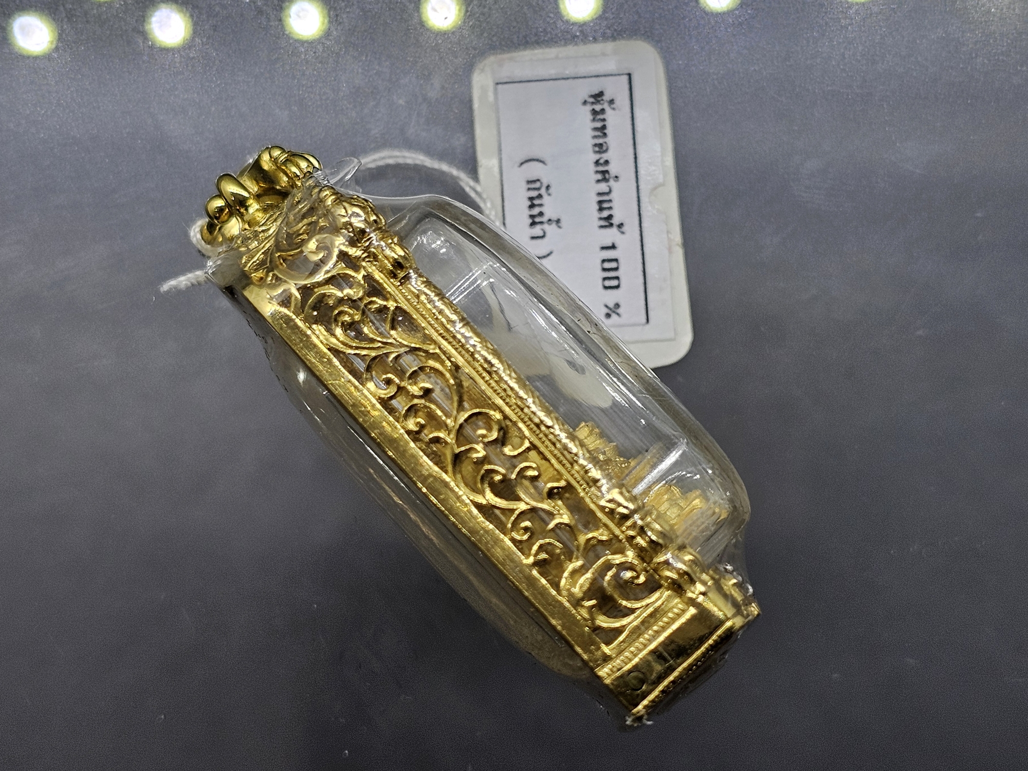 พระพิฆเนศวร ปางประทานพร รุ่นมีไว้ได้ทรัพย์ เนื้อทองทรายนวล วัดสมานรัตนาราม ปี 2558 พร้อมกรอบหุ้มทอง 24 K ฝังเพชร cz กล่องเดิม