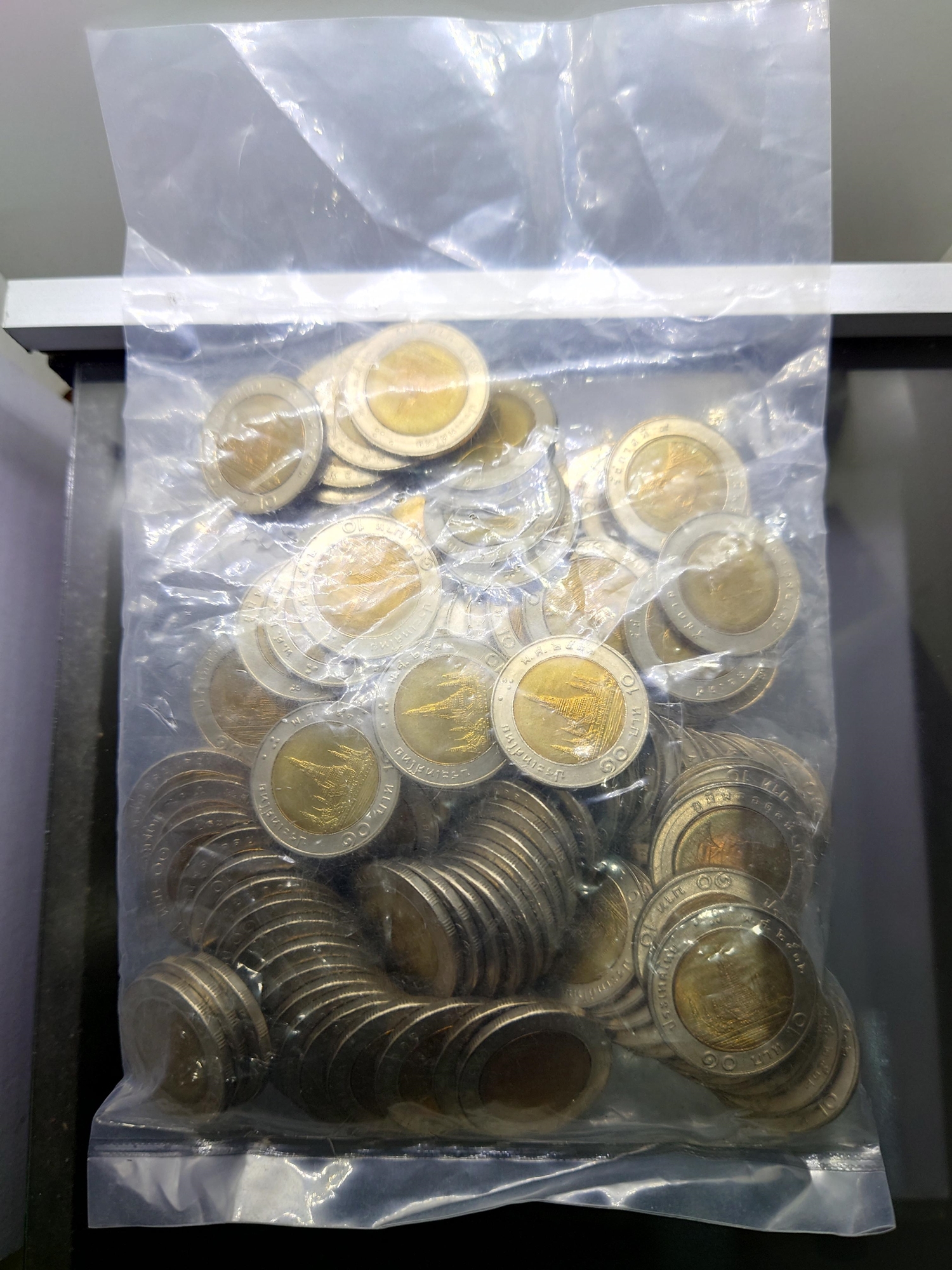 เหรียญยกถุง (100 เหรียญ) เหรียญ 10 บาท หมุนเวียน ปี พ.ศ.2532 ไม่ผ่านใช้ เหรียญแกะหลอด หลอดแตก