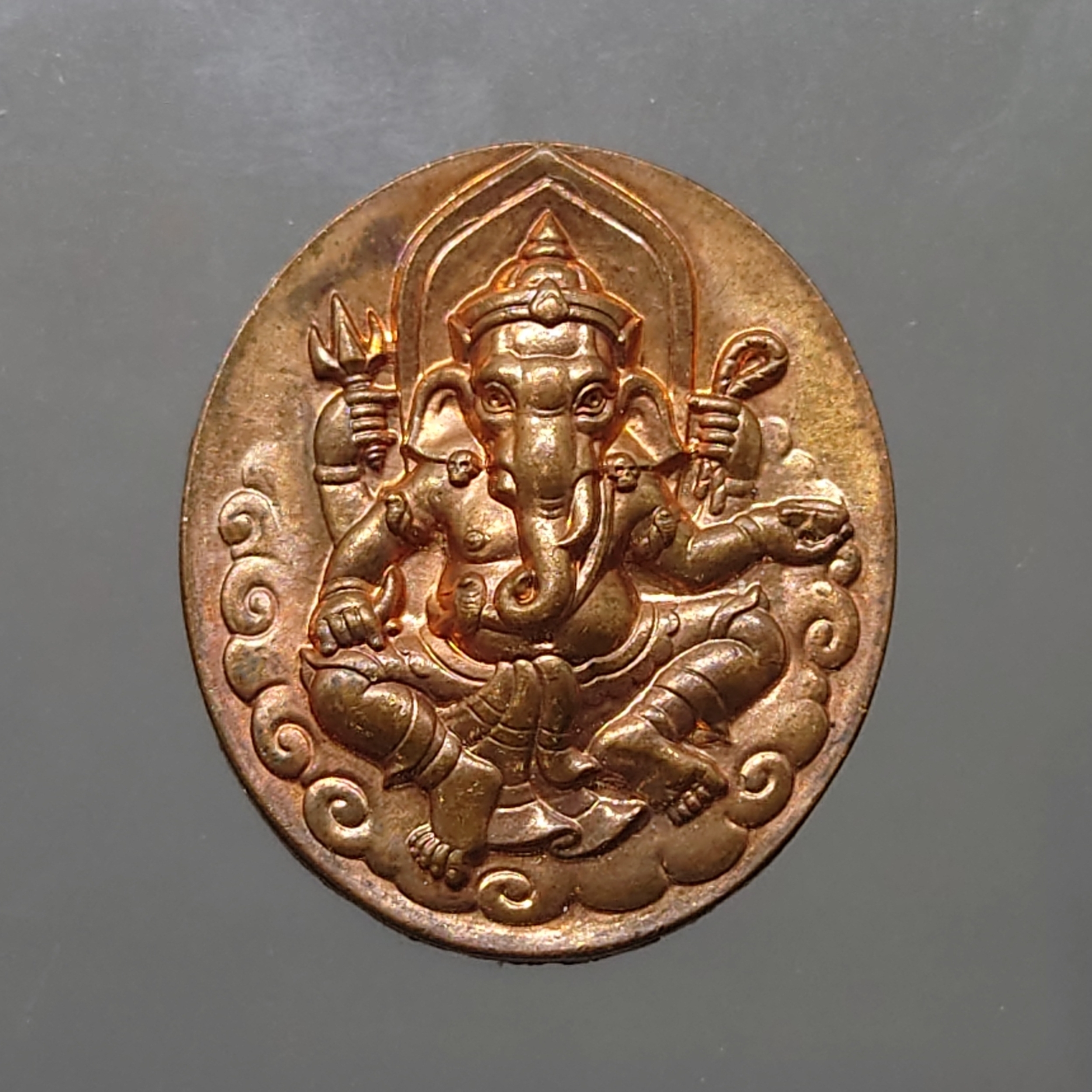 เหรียญพระพิฆเนศ หลังสัญลักษณ์โอม กรมศิลปากร ปี 2540 พร้อมกล่องไม้ กล่องขาว ใบคาถา หายาก