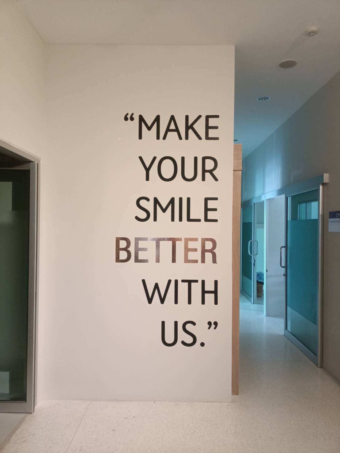 ป้ายติดกำแพง MAKE YOUR SMILE BETTER WITH US