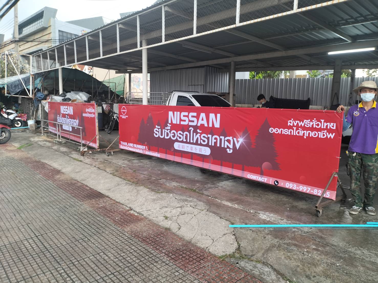 ป้ายไวนิลขึงโครงเหล็ก งาน NISSAN