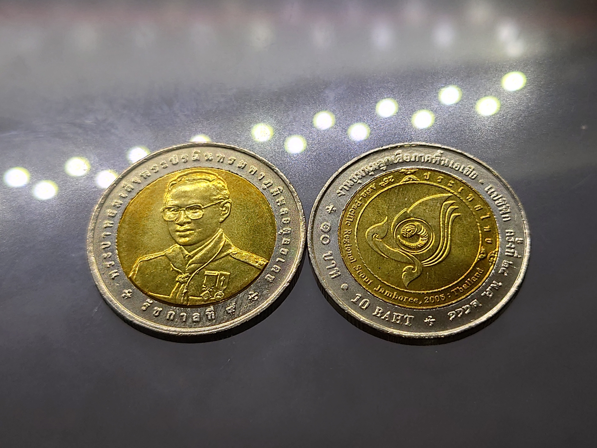 เหรียญยกถุง (100 เหรียญ) เหรียญ 10 บาท สองสี ที่ระลึกงานชุมนุมลูกเสือภาคพื้นเอเชีย-แปซิฟิก ครั้งที่ 25 พ.ศ.2549 ไม่ผ่านใช้